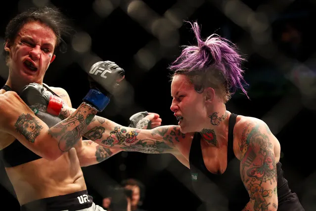 Bec Rawlings (R) of Australia punches Jessica-Rose Clark of Australia in their women's flyweightbout during the UFC Fight Night at Qudos Bank Arena on November 19, 2017 in Sydney, Australia. (Photo by Mark Kolbe/Getty Images)