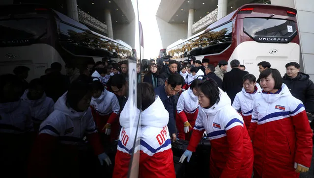 North Korea's women ice hockey athletes arrive at the South's CIQ (Customs, Immigration and Quarantine), just south of the demilitarized zone separating the two Koreas in Paju, South Korea January 25, 2018. (Photo by Reuters/Yonhap)