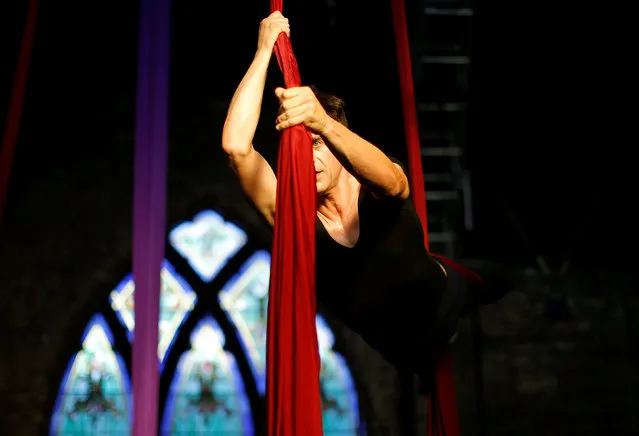Jeff Kirschner practices on the silks at the Aloft Loft circus training and teaching school which was converted from a church, in Chicago, Illinois, U.S., September 20, 2016. (Photo by Jim Young/Reuters)