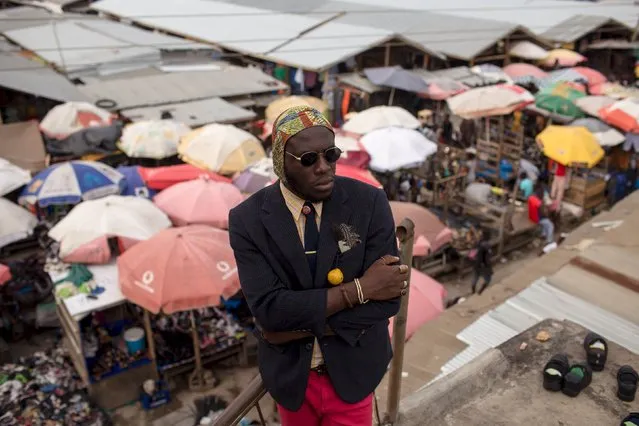 DJ Evans Mireku Kissi stands on a terrace at Kantamanto Market in Accra, Ghana, June 17, 2015. (Photo by Francis Kokoroko/Reuters)