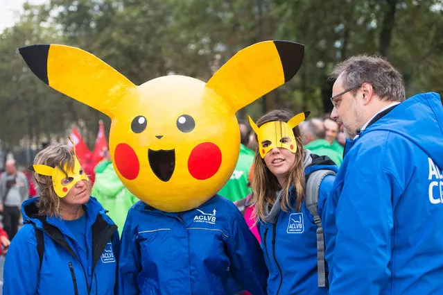 Liberal union members wear “Pikachu” masks during a demonstration against the center-right government's austerity policy after various labor unions called for a demonstration in Brussels, Belgium on September 29, 2016. (Photo by Aurore Belot/NurPhoto via Getty Images)