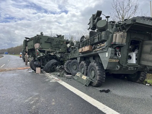 Damaged military vehicles are seen on the side of the A6 highway near Amberg, Germany following an accident on Monday, April 17, 2023. German police say seven soldiers were injured when several military vehicles crashed into each other in an accident on a Bavarian highway on Monday. Several German media outlets reported Tuesday that the vehicles involved belonged to the U.S. military, but German police said they were not authorized to give out information on the nationality of those injured. (Photo by Haubner/dpa via AP Photo)