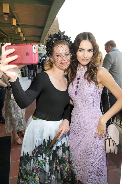 Actresses Elizabeth Banks (L) and Camilla Belle at the 2016 Breeders' Cup World Championships at Santa Anita Park on November 5, 2016 in Arcadia, California. (Photo by Charley Gallay/Getty Images for Breeders' Cup)