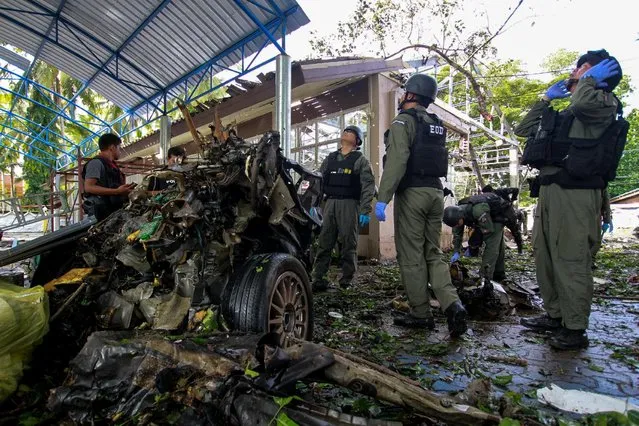 Military personnel inspect the site of a bomb attack at Yaring district, which injured five local residents according to local media, in the troubled southern province of Pattani, Thailand, November 18, 2016. (Photo by Surapan Boonthanom/Reuters)