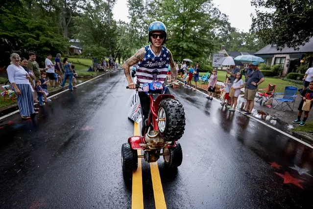 People participate in Fourth of July Parade on US Independence Day in Avondale Estates, Georgia, USA, 04 July 2023. (Photo by Erik S. Lesser/EPA)