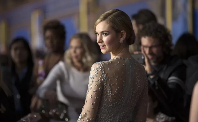 Cast member Lily James poses at the premiere of "Cinderella" at El Capitan theatre in Hollywood, California March 1, 2015. The movie opens in the U.S. on March 13. REUTERS/Mario Anzuoni  (UNITED STATES - Tags: ENTERTAINMENT)