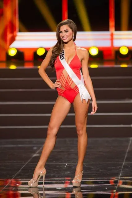 This photo provided by the Miss Universe Organization shows Luna Voce, Miss Italy 2013, competes in the swimsuit competition during the Preliminary Competition at Crocus City Hall, Moscow, on November 5, 2013. (Photo by Darren Decker/AFP Photo)