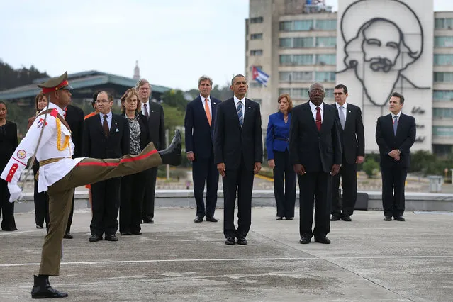 President Barack Obama stands with Salvador Valdez Mesa, Vice President of the Council of Ministry, as they take part in a wreath laying ceremony at the Jose Marti memorial in Revolution Square on March 21, 2016 in Havana, Cuba. Mr. Obama's visit is the first in nearly 90 years for a sitting president, the last one being Calvin Coolidge. (Photo by Joe Raedle/Getty Images)