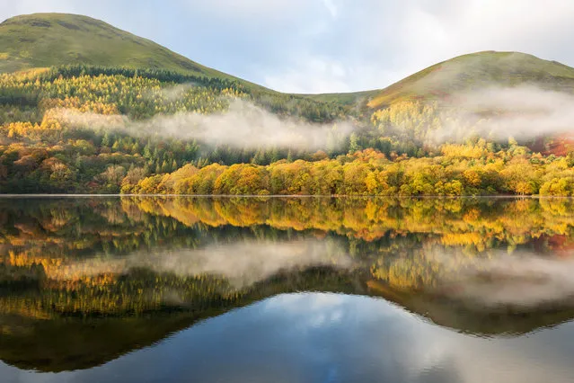 Beautiful autumn colour and low cloud is reflected in Loweswater on November 1, 2018 in Loweswater, United Kingdom. After the long summer, colder and more wintery weather has now settled in across the country. (Photo by Tom White/Getty Images)