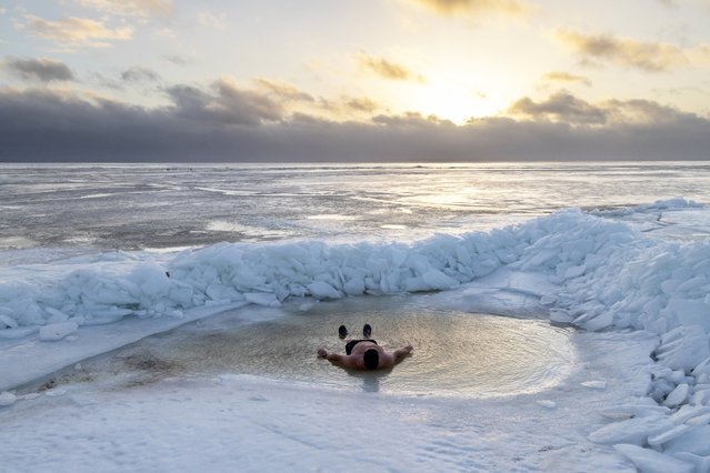 Shoreline ice pileup also known as ice tsunami is seen on the coast of the Baltic Sea at the Hel Peninsula on January 23, 2024 in northern Poland. Sudden surge of temperatures after days of cold and strong winds caused massive ice pilings which serve as a winter tourist attraction. (Photo by Barbara Ostrowska/East News/Rex Features/Shutterstock)