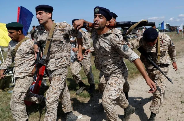 Marines from Iran take part in the International Army Games 2019 at the at Khmelevka firing ground on the Baltic Sea coast in Kaliningrad Region, Russia on August 6, 2019. (Photo by Vitaly Nevar/Reuters)