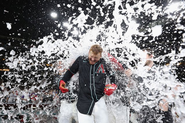 The Arizona Diamondbacks' Pavin Smith is dunked with water after he hit a home run to defeat the San Francisco Giants on Monday, June 3, 2024. (Photo by Christian Petersen/Getty Images)