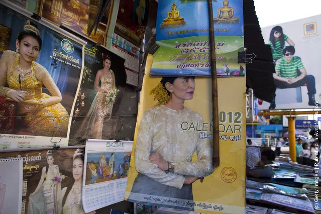  2012 calendar showing Aung San Suu Kyi  is for sale along the city streets in Yangon, Myanmar