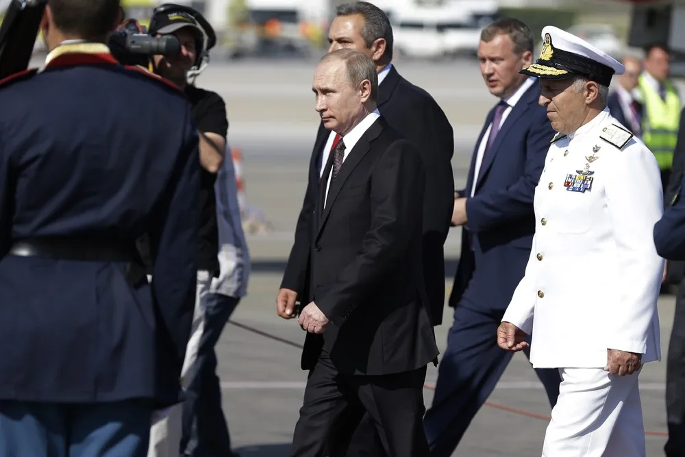 Putin Blasts West on First Trip to EU Country this Year