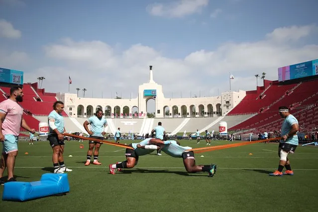 The Los Angeles Giltinis warm up prior to their match against the Rugby United New York at Los Angeles Coliseum on April 10, 2022 in Los Angeles, California. (Photo by Joe Scarnici/Getty Images for LA Giltinis)
