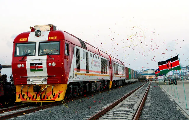 A cargo train is launched to operate on the Standard Gauge Railway (SGR) line constructed by the China Road and Bridge Corporation (CRBC) and financed by Chinese government in Kenya's coastal city of Mombasa, May 30, 2017. (Photo by Reuters/Stringer)