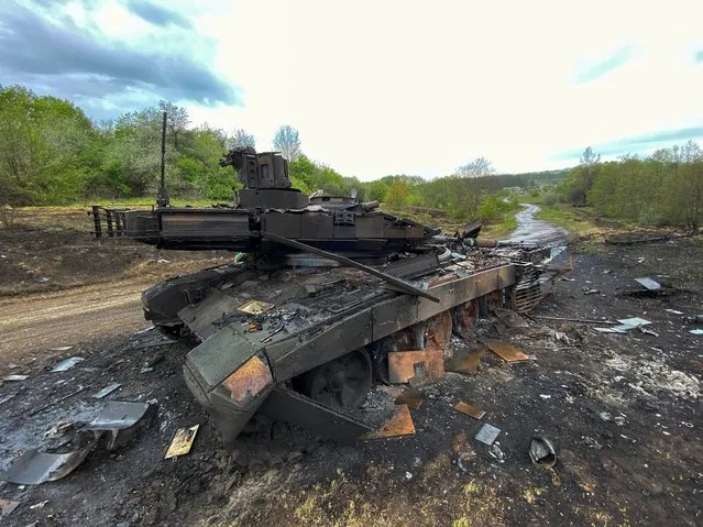 Russian main battle tank T-90M Proryv destroyed by Ukrainian Armed Forces is seen near the village of Staryi Saltiv, as Russia's attack on Ukraine continues, in Kharkiv region, Ukraine May 9, 2022. (Photo by Vitalii Hnidyi/Reuters)