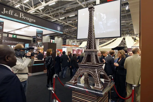France: A chocolate model of the Eiffel Tower is displayed at the 14th Salon du Chocolat (Paris Chocolate Show) in Paris October 28, 2008. (Photo by Benoit Tessier/Reuters)