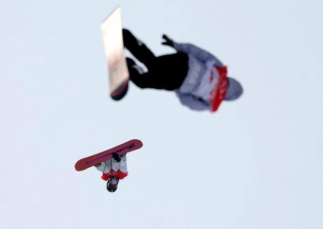 Ayumu Hirano of Japan and another athlete compete in the Men's Snowboard Halfpipe Qualification on Day 5 of the Beijing 2022 Winter Olympic Games at Genting Snow Park on February 9, 2022 in Zhangjiakou, China. (Photo by Mike Blake/Reuters)
