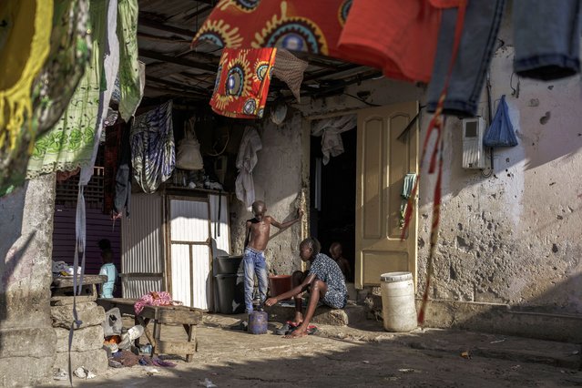 Salamba Ndiaye, a 28-year-old who tried to migrate to Europe twice, is photographed at her family house in Thiaroye-Sur-Mer, Senegal, Friday, August 23, 2024. Ndiaye is one of thousands of young Senegalese who try to flee poverty and the lack of job opportunities in the West African country each year to head to Spain. More than 22,300 people have landed on the Canary Islands from January to mid-August this year. (Photo by Annika Hammerschlag/AP Photo)