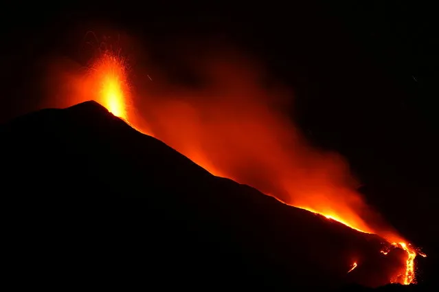 Mount Etna erupts as seen from Fornazzo, Italy on May 20, 2022. (Photo by Antonio Parrinello/Reuters)