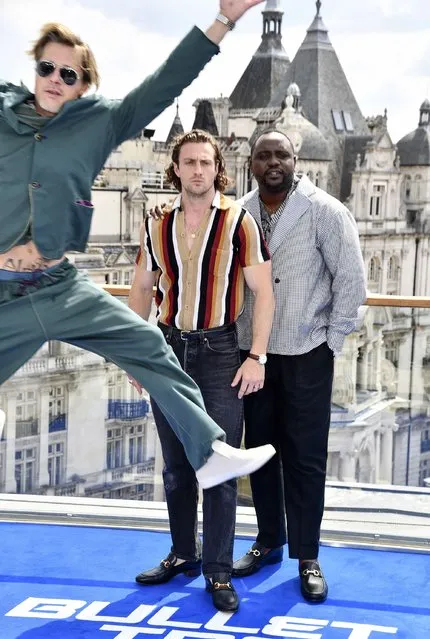 (L-R) Brad Pitt, Aaron Taylor-Johnson and Brian Tyree Henry attend the “Bullet Train” Photocall at The Corinthia Hotel on July 20, 2022 in London, England. (Photo by Gareth Cattermole/Getty Images)