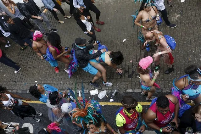 Revellers dance at the Notting Hill Carnival in west London, August 31, 2015. (Photo by Eddie Keogh/Reuters)