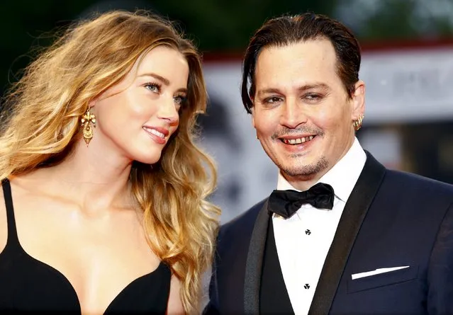 Actor Johnny Depp (R) and his wife Amber Heard (L) attend the red carpet event for the movie “Black Mass” at the 72nd Venice Film Festival in northern Italy September 4, 2015”. (Photo by Stefano Rellandini/Reuters)