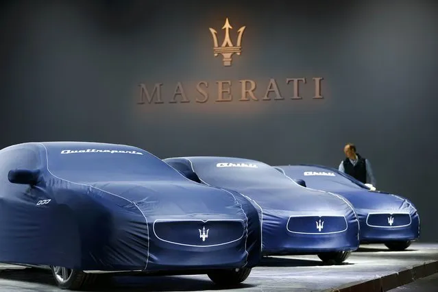 Veiled Maseratis are pictured during the media day at the Frankfurt Motor Show (IAA) in Frankfurt, Germany, September 14, 2015. (Photo by Kai Pfaffenbach/Reuters)