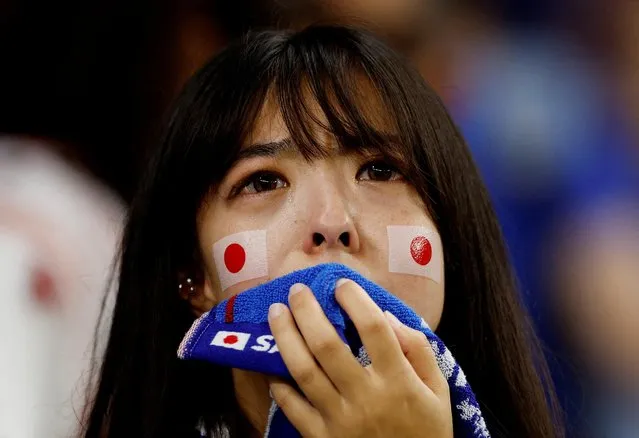 A fan of Japan reacts after Crotia winning the penalty shoot out during the FIFA World Cup Qatar 2022 Round of 16 match between Japan and Croatia at Al Janoub Stadium on December 5, 2022 in Al Wakrah, Qatar. (Photo by John Sibley/Reuters)