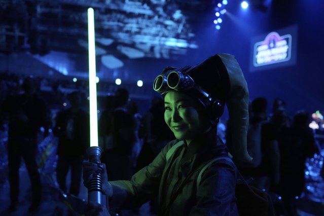 A Star Wars supporter poses for a photo during a fan convention called the Star Wars Celebration Japan in Chiba, near Tokyo, Friday, April 18, 2025. (Photo by Hiro Komae/AP Photo)