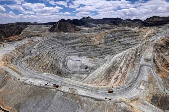 Aerial view of a mine open pit on the way to the city of La Oroya, located at 3,745 meters above sea level in the department of Junin, east of Lima, taken on November 7, 2022. The mining town of La Oroya, one of the most polluted localities on the planet, prefers to put its pocketbook before its health and is betting on reopening a metallurgical smelter that served as a lifeline for its economy but also caused respiratory ailments. (Photo by Ernesto Benavides/AFP Photo)