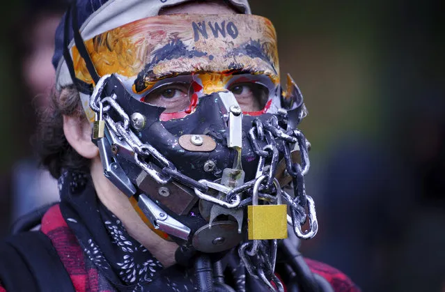 A man takes part in an anti-mask rally during the coronavirus pandemic in Montreal, on Wednesday, September 30, 2020. (Photo by Paul Chiasson/The Canadian Press via AP Photo)