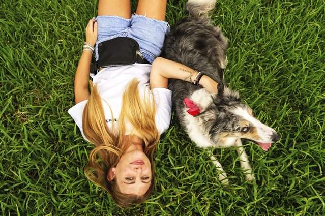 Sophie Nocera, 21, a senior at Eckerd College, poses for a photo with her dog Zuco on Wednesday, August 20, 2025 in St. Petersburg, Fla. (Photo by Tina Russell/AP Photo)