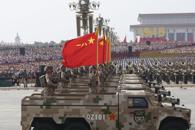 Hero units' banner formation marches through Tian'anmen Square during a military parade in Beijing, capital of China, Sept. 3, 2025. China on Wednesday held a grand gathering to commemorate the 80th anniversary of the victory in the Chinese People's War of Resistance against Japanese Aggression and the World Anti-Fascist War. (Photo by Xinhua News Agency/Rex Features/Shutterstock)
