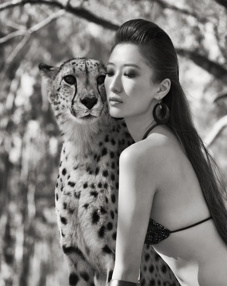 Models Pose with Endangered Animals