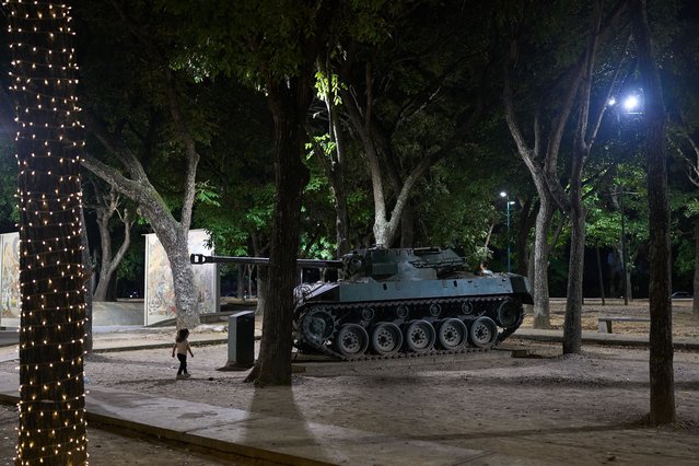 An armored vehicle is on display along Los Proceres boulevard in Caracas, Venezuela, Saturday, December 6, 2025. (Phoot by Ariana Cubillos/AP Photo)