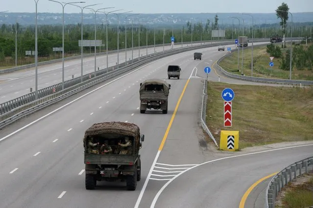 A military column of Wagner private mercenary group drives along M-4 highway, which links the capital Moscow with Russia's southern cities, near Voronezh, Russia on June 24, 2023. (Photo by Reuters/Stringer)