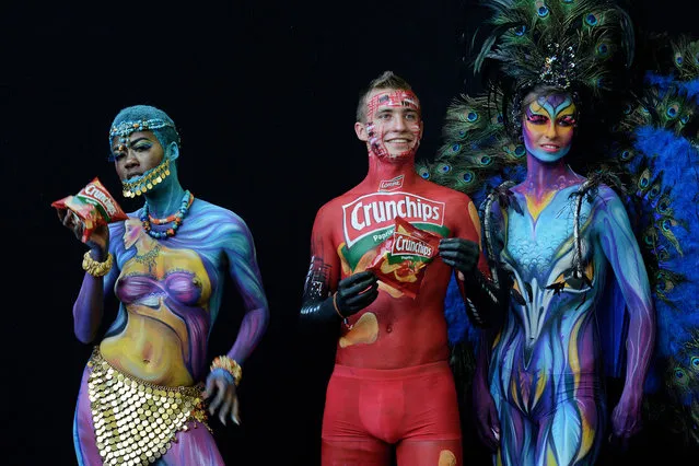 Models pose for a picture a  the 21st World Bodypainting Festival 2018 on July 13, 2018 in Klagenfurt, Austria. (Photo by Didier Messens/Getty Images)