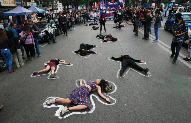Members of feminist organisations take part in a rally against gender violence on the International Day for the Elimination of Violence Against Women, in Valparaiso, Chile, November 25, 2016. (Photo by Rodrigo Garrido/Reuters)