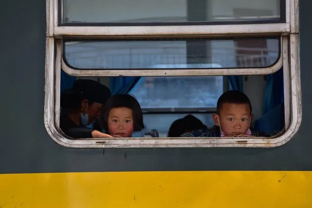 Young passengers on a train in Sichuan province, southwest China on April 27, 2021. (Photo by Xinhua News Agency/Alamy Live News)