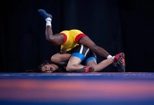Zaineb Sghaier of Tunis in action against Natacha Veronique Nabaina of Cameroon in the Wrestling Women's Freestyle 65kg Group B at the Asia Pavilion, Youth Olympic Park, Buenos Aires, Argentina, October 13, 2018. (Photo by Lukas Schulze for OIS/IOC/Handout via Reuters)