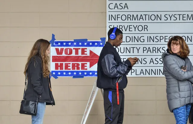 Voters were lined up outside of the Vigo County Annex in Terre Haute, Ind.,. on Monday, November 5, 2018, to take advantage of the final day of early voting. (Photo by Austen Leake/Tribune-Star via AP Photo)