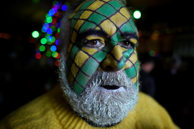 Trevis Gleason poses for a photograph during an Irish tradition of Hunting of the Wren festival held every St. Stephen's Day in Dingle, Ireland December 26, 2016. (Photo by Clodagh Kilcoyne/Reuters)