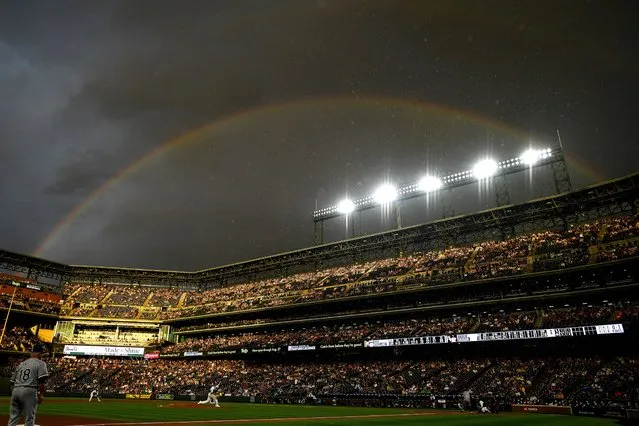 Kyle Freeland #21 of the Colorado Rockies pitches against the Chicago White Sox in the fourth inning in a general view as a rainbow is seen in the stadium at Coors Field on August 19, 2023 in Denver, Colorado. (Photo by Dustin Bradford/Getty Images)