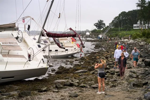 At least 8 boats broke from their moorings and ran ashore on August 22, 2021 in Jamestown, Rhode Island United States. Rain and high winds from the Henri Jamestown since in the early morning. (Photo by David Degner/The Washington Post)