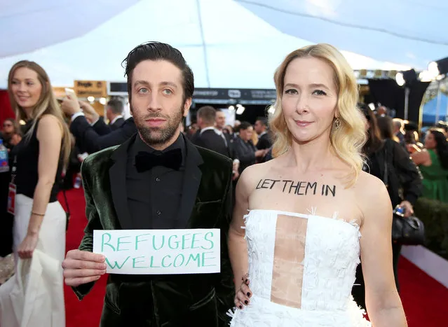 Actor Simon Helberg and his wife actress Simon Helberg make a political statement about the current U.S. restriction on refugees as they arrive at the 23rd Screen Actors Guild Awards in Los Angeles, California, U.S., January 29, 2017. (Photo by Lucy Nicholson/Reuters)