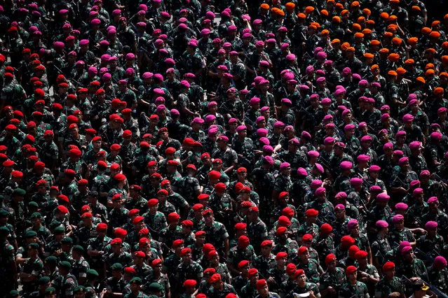 Soldiers gather as they attend a ceremony ahead of the upcoming Indonesia's general election in Jakarta, Indonesia, April 14, 2019. (Photo by Willy Kurniawan/Reuters)