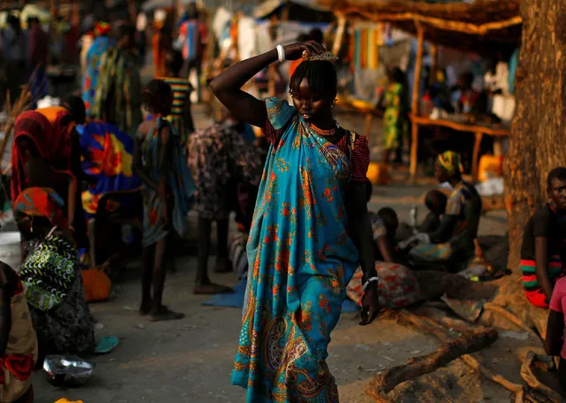 A woman walks in a market in the town of Pibor, in Boma state, east South Sudan, February 1, 2017. (Photo by Siegfried Modola/Reuters)