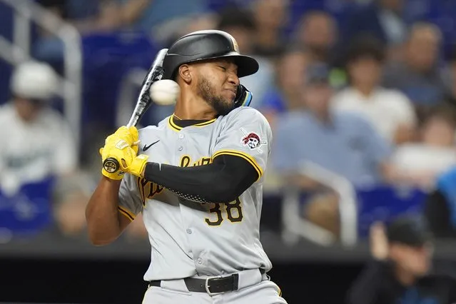 Pittsburgh Pirates' Edward Olivares reacts to a close pitch as he bats during the fifth inning of a baseball game against the Miami Marlins, Friday, March 29, 2024, in Miami. (Photo by Wilfredo Lee/AP Photo)